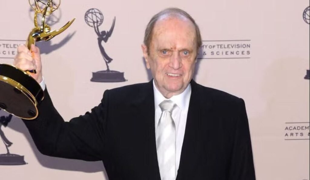 Bob Newhart holds up his first Emmy