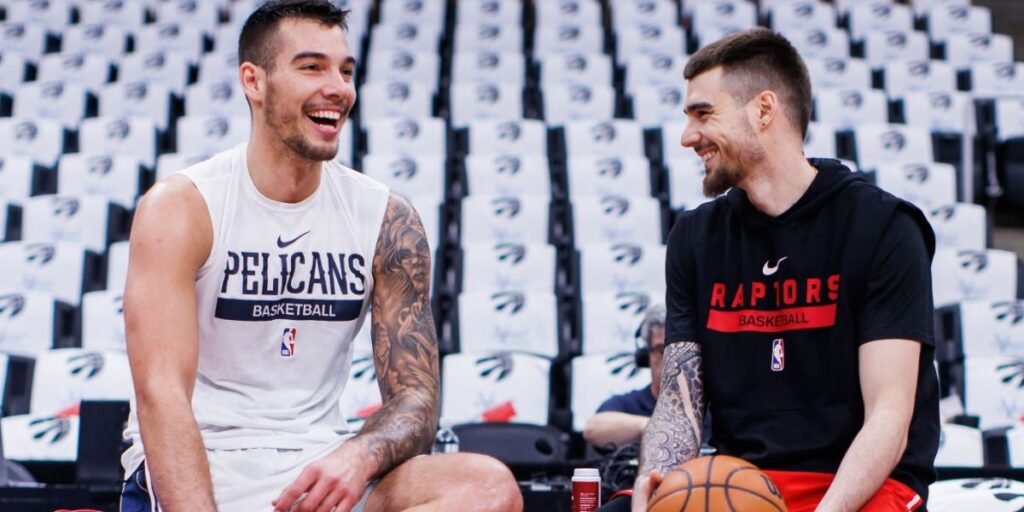 Brother Willy Hernangomez and Juancho Hernangomez